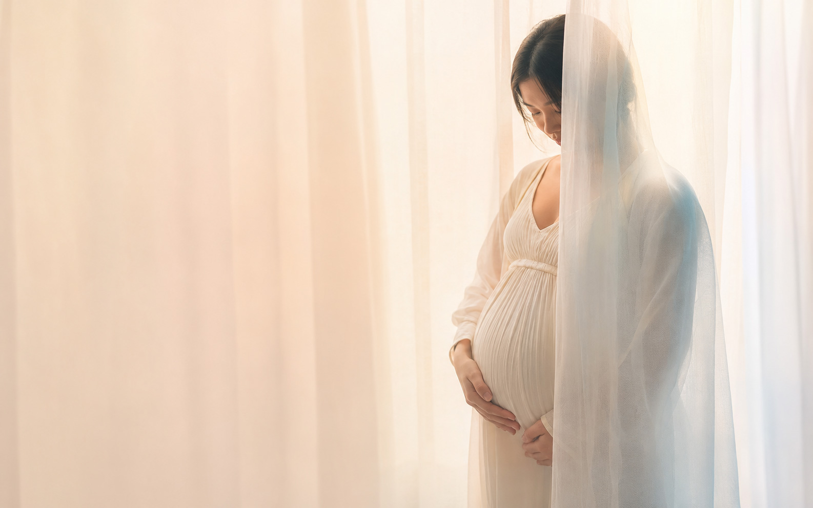 Expectant mother in soft sunlight